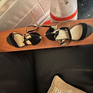 Size 7 black and gold strap high heels